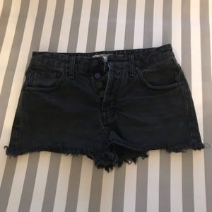Black denim Free People cut off shorts.